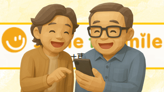 スマホを使うシニア画像